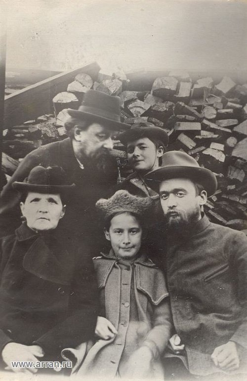 Konstantin Tsiolkovsky with his family in the courtyard of his house during the flood of 1908.